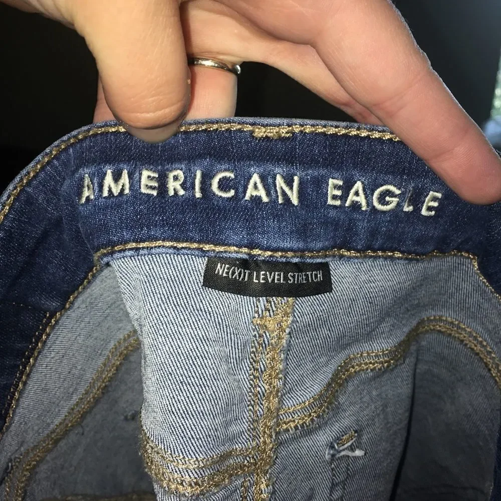 American Eagle raw hem hi-rise Y2K denim miniskirt